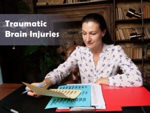 traumatic brain injury lawyer reviewing documents