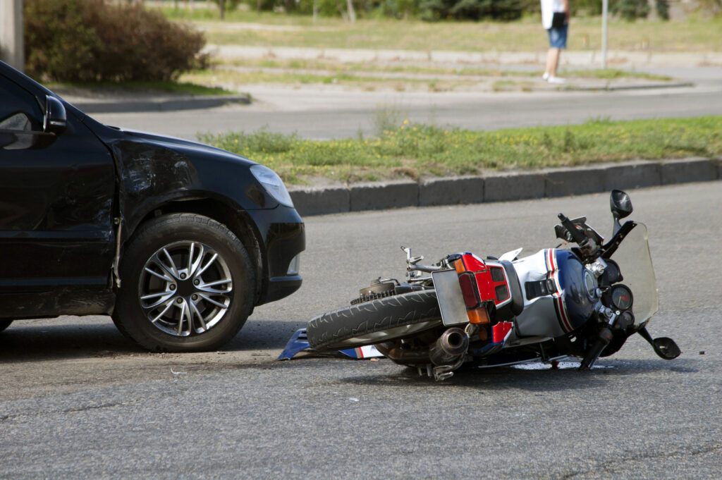motorcycle laying down on the road after being hit motorcycle accident attorney sacramento